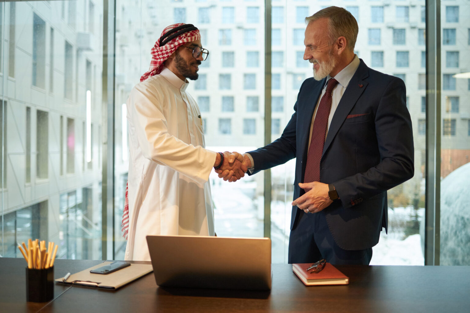 Business partners shaking hands