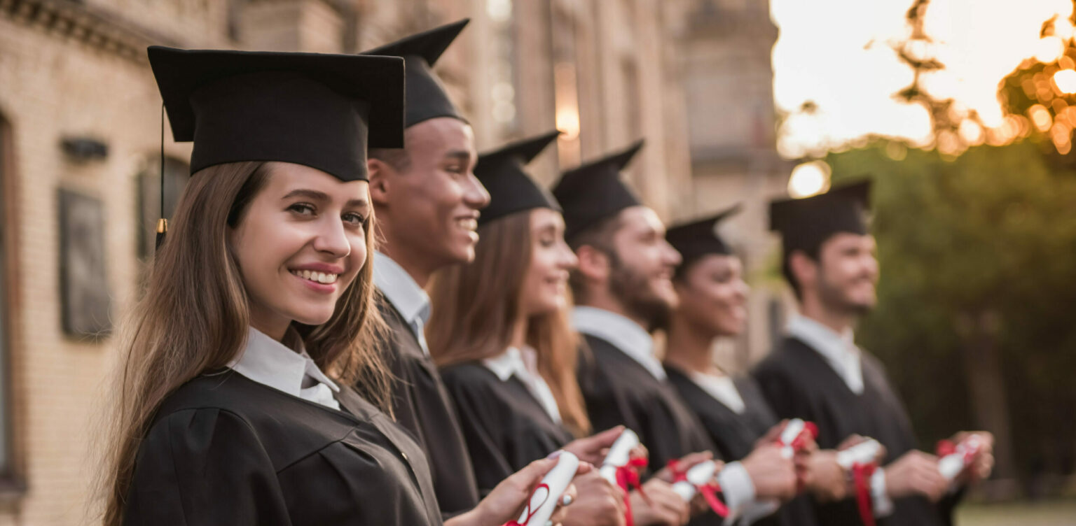 Graduates celebrating their qualification